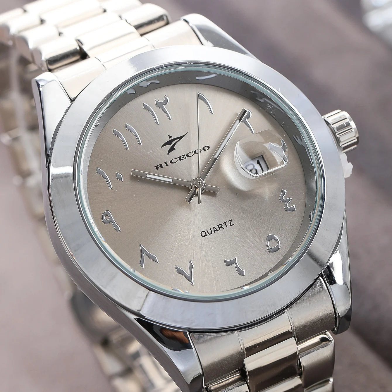 Watch with Arabic script in stainless steel